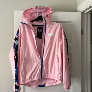 Original Helly Hansen pink waterproof jacket with cool accents. Size large.